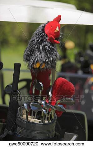 Stock Image - Close-up of golf clubs in a golf bag. Fotosearch