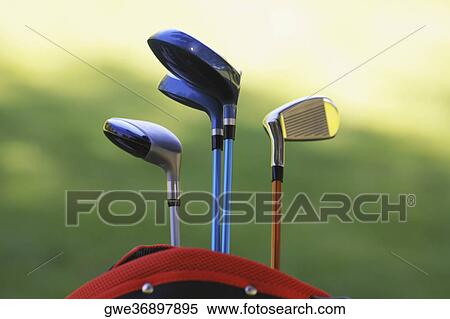 Stock Photography - Close-up of golf clubs in a golf bag. Fotosearch