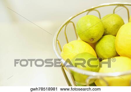 Close-up of lemons in a basket View Large Photo Image Stock Image - Close-up of lemons in a basket. Fotosearch