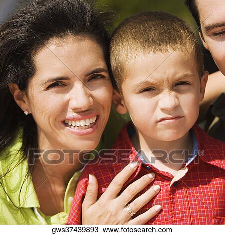 Stock Image - Close-up of parents and their son. Fotosearch