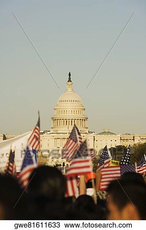 Crowd holding the American flags in front of a government building, California State Capitol Building, California, USA View Large Photo Image Stock Image - Crowd holding the American flags in front of a government building, California State Capitol Building, California, USA. Fotosearch