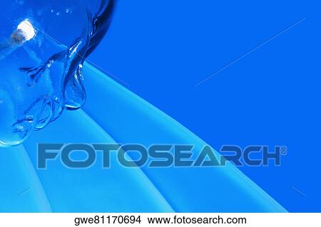 Picture - Electric light in a glass mannequin. Fotosearch