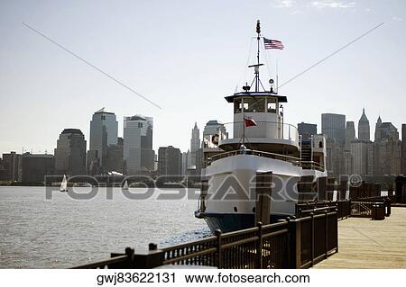 Ferry at a dock, Manhattan, New York City, New York State, USA View Large Photo Image Stock Image - Ferry at a dock, Manhattan, New York City, New York State, USA. Fotosearch