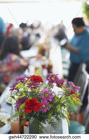 Flower vase on a dining table View Large Photo Image Stock Image - Flower vase on a dining table. Fotosearch
