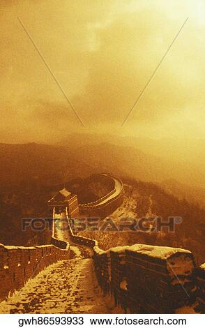 Stock Image - Fortified wall passing through mountains, Great Wall Of China, China. Fotosearch