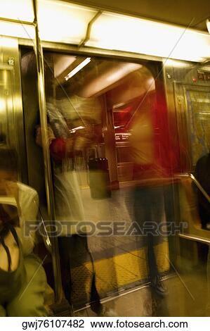 Group of people in a subway train, New York City, New York State, USA View Large Photo Image Stock Image - Group of people in a subway train, New York City, New York State, USA. Fotosearch
