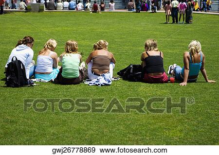 Group of people sitting on the ground, New York City, New York State, USA View Large Photo Image Stock Photo - Group of people sitting on the ground, New York City, New York State, USA. Fotosearch