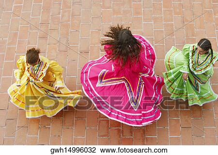 High angle view of three young women dancing View Large Photo Image Stock Image - High angle view of three young women dancing. Fotosearch