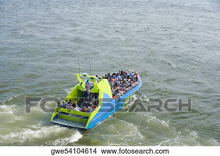High angle view of tourist in a tour boat View Large Photo Image Picture - High angle view of tourist in a tour boat. Fotosearch