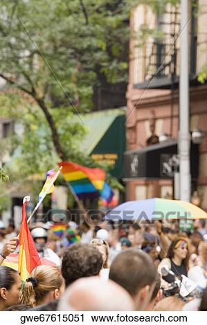 Large group of people at a gay parade View Large Photo Image Stock Image - Large group of people at a gay parade. Fotosearch