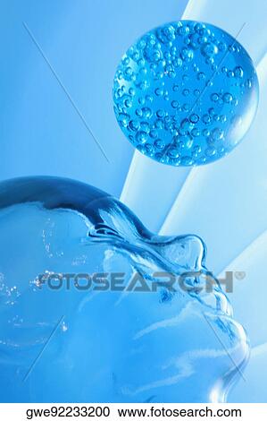 Low angle view of a glass paperweight and a glass mannequin View Large Photo Image Stock Image - Low angle view of a glass paperweight and a glass mannequin. Fotosearch