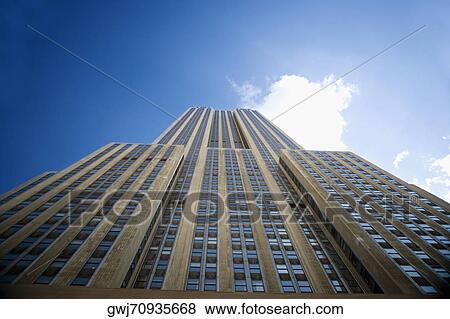 Low angle view of a skyscraper, Empire State Building, Manhattan, New York City, New York State, USA View Large Photo Image Stock Photo - Low angle view of a skyscraper, Empire State Building, Manhattan, New York City, New York State, USA. Fotosearch