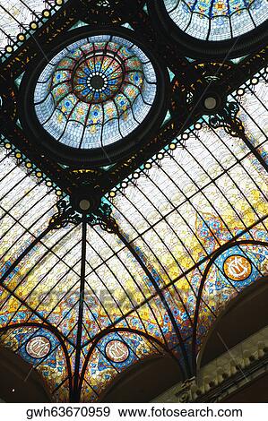 Low angle view of a stained glass ceiling View Large Photo Image Stock Photo - Low angle view of a stained glass ceiling. Fotosearch