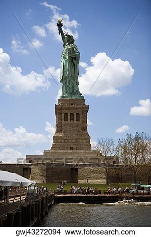 Low angle view of a statue, Statue Of Liberty, Liberty Island, New York City, New York State, USA View Large Photo Image Picture - Low angle view of a statue, Statue Of Liberty, Liberty Island, New York City, New York State, USA. Fotosearch