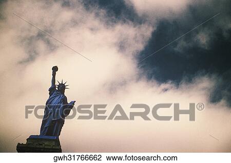 Low angle view of a statue, Statue Of Liberty, New York City, New York State, USA View Large Photo Image Stock Image - Low angle view of a statue, Statue Of Liberty, New York City, New York State, USA. Fotosearch