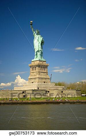 Stock Image - Low angle view of a statue, Statue Of Liberty, New York City, New York State, USA. Fotosearch