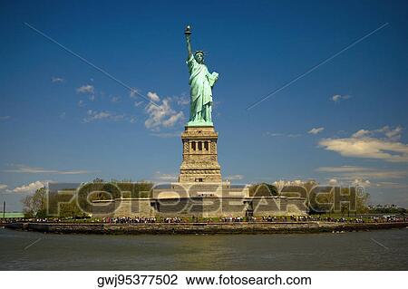 Low angle view of a statue, Statue Of Liberty, Liberty Island, New York City, New York State, USA View Large Photo Image Stock Image - Low angle view of a statue, Statue Of Liberty, Liberty Island, New York City, New York State, USA. Fotosearch