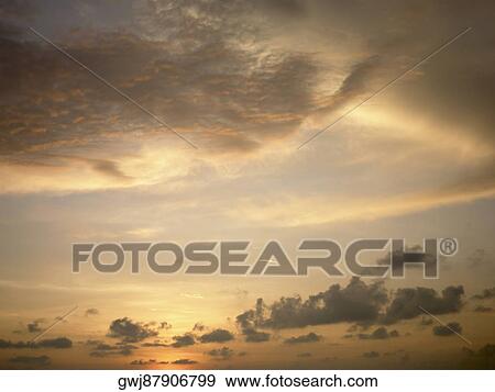 Low angle view of clouds in the sky View Large Photo Image Stock Photo - Low angle view of clouds in the sky. Fotosearch