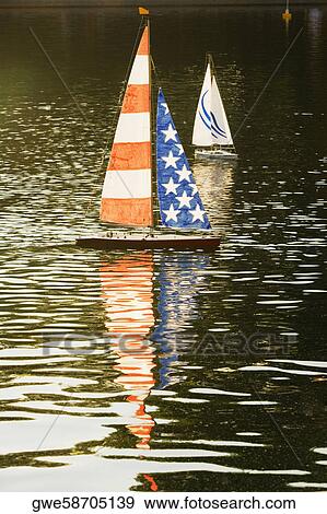 Low angle view of sailboats in the river View Large Photo Image Stock Photo - Low angle view of sailboats in the river. Fotosearch