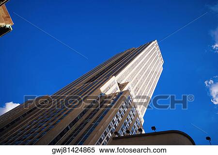 Low angle view of skyscrapers, Empire State Building, Manhattan, New York City, New York State, USA View Large Photo Image Stock Photography - Low angle view of skyscrapers, Empire State Building, Manhattan, New York City, New York State, USA. Fotosearch