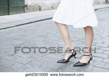 Low section view of a woman View Large Photo Image Stock Image - Low section view of a woman . Fotosearch