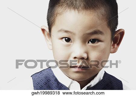 Portrait of a boy posing View Large Photo Image Stock Photo - Portrait of a boy posing. Fotosearch