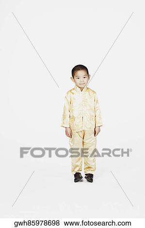 Stock Photo - Portrait of a boy posing. Fotosearch