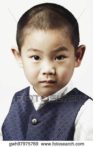 Portrait of a boy posing View Large Photo Image Stock Photo - Portrait of a boy posing. Fotosearch