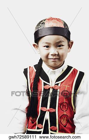 Stock Image - Portrait of a boy smiling. Fotosearch