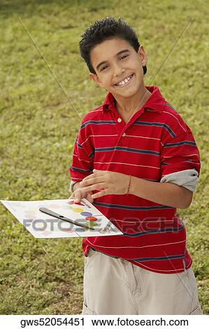 Stock Image - Portrait of a boy smiling. Fotosearch