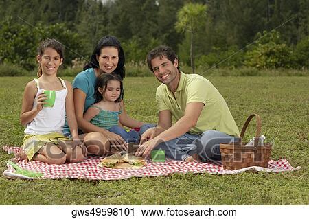 Stock Image - Portrait of a family at a picnic. Fotosearch