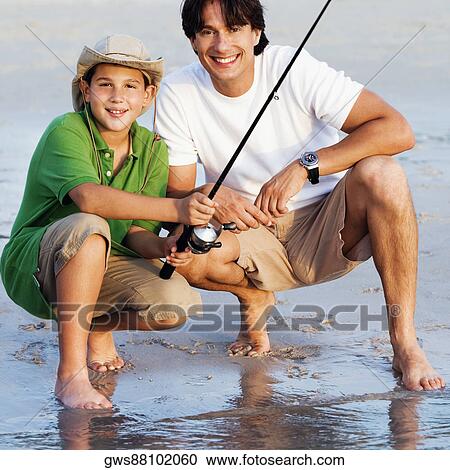 Portrait of a father and his son fishing View Large Photo Image Stock Image - Portrait of a father and his son fishing. Fotosearch