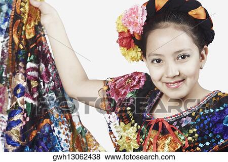 Portrait of a girl posing and smiling View Large Photo Image Stock Photo - Portrait of a girl posing and smiling. Fotosearch