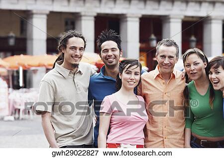 Stock Photo - Portrait of a group of people standing together . Fotosearch