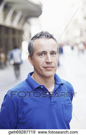 Portrait of a mature man on the street View Large Photo Image Stock Photo - Portrait of a mature man on the street . Fotosearch