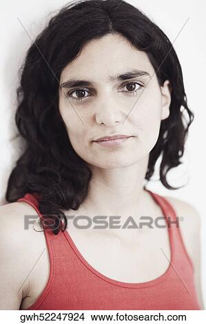 Portrait of a mid adult woman looking serious View Large Photo Image Picture - Portrait of a mid adult woman looking serious. Fotosearch