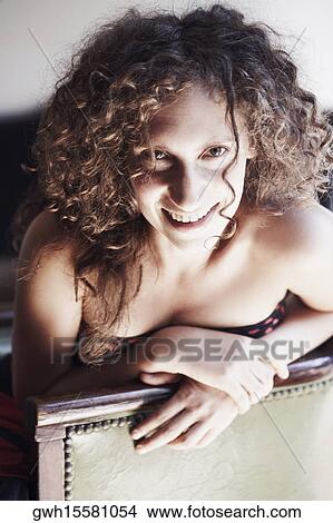 Portrait of a mid adult woman smiling View Large Photo Image Picture - Portrait of a mid adult woman smiling. Fotosearch