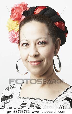 Portrait of a mid adult woman smiling View Large Photo Image Stock Image - Portrait of a mid adult woman smiling. Fotosearch