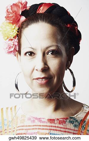 Portrait of a mid adult woman smiling View Large Photo Image Stock Photo - Portrait of a mid adult woman smiling. Fotosearch