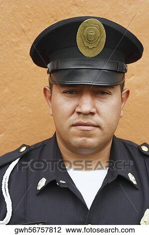 Stock Image - Portrait of a police officer. Fotosearch