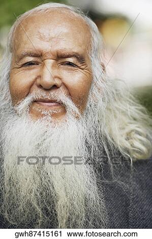 Portrait of a senior man smiling View Large Photo Image Stock Image - Portrait of a senior man smiling. Fotosearch