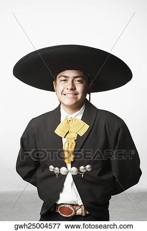 Portrait of a teenage boy in traditional clothing View Large Photo Image Stock Photo - Portrait of a teenage boy in traditional clothing. Fotosearch