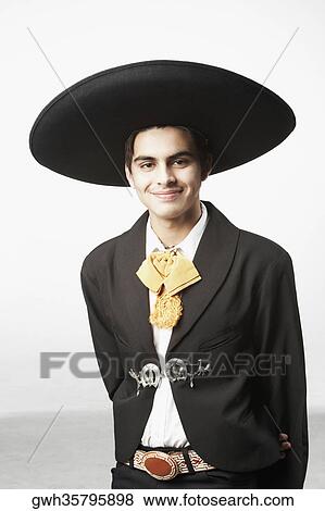 Stock Photo - Portrait of a teenage boy in traditional clothing. Fotosearch
