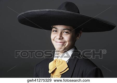 Portrait of a teenage boy in traditional clothing View Large Photo Image Stock Photo - Portrait of a teenage boy in traditional clothing. Fotosearch