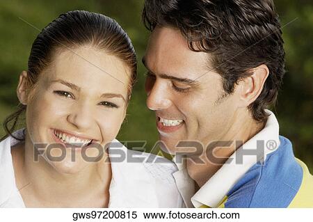 Portrait of a teenage girl and a young man smiling View Large Photo Image Stock Photography - Portrait of a teenage girl and a young man smiling. Fotosearch