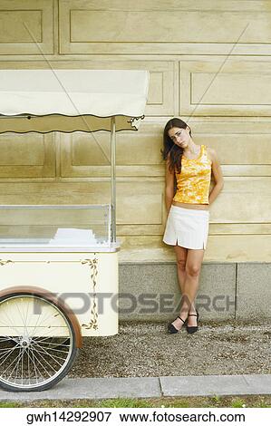 Portrait of a teenage girl leaning against a wall View Large Photo Image Stock Photo - Portrait of a teenage girl leaning against a wall . Fotosearch