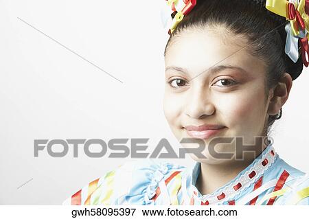 Stock Photo - Portrait of a teenage girl smiling. Fotosearch