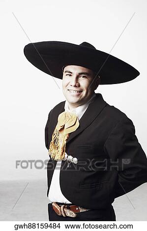 Picture - Portrait of a young man in traditional clothing. Fotosearch