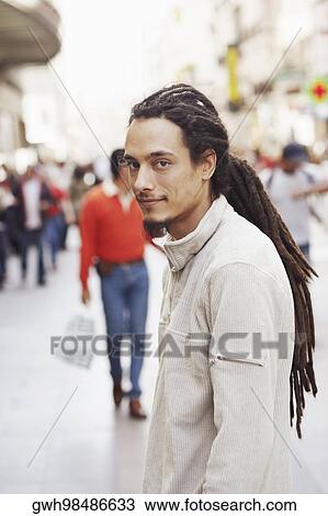 Portrait of a young man on the street View Large Photo Image Stock Image - Portrait of a young man on the street . Fotosearch