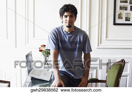Portrait of a young man View Large Photo Image Stock Image - Portrait of a young man. Fotosearch
